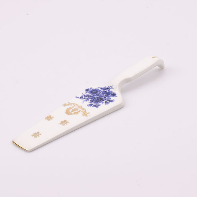 Pelle à tarte en porcelaine blanche avec motif floral bleu