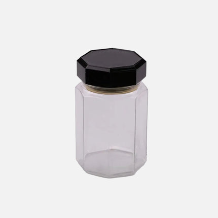 Pot en verre octogonal transparent avec couvercle noir
