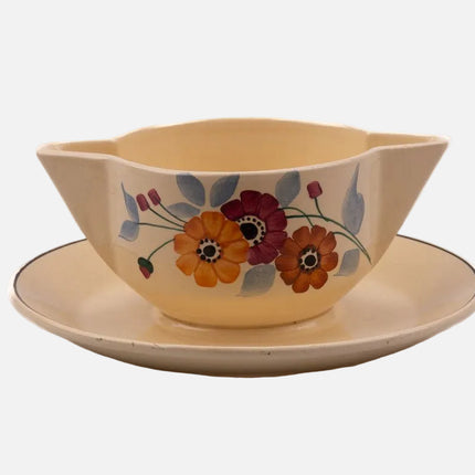 Saucière vintage en céramique Saint-Amand crème et à motifs fleuris