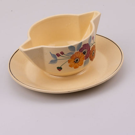 Saucière vintage en céramique Saint-Amand crème et à motifs fleuris