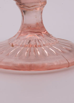 Présentoir à gateaux en verre rose sur pied