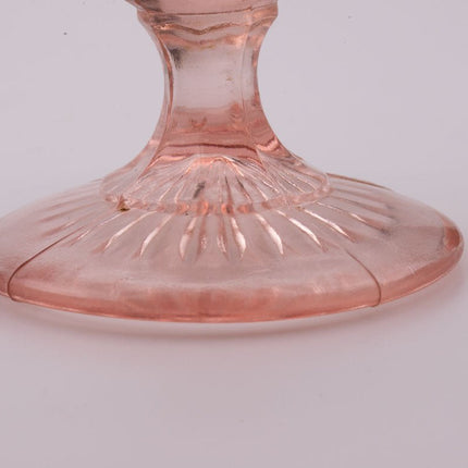 Présentoir à gateaux en verre rose sur pied