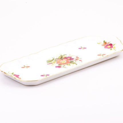 Plateau en porcelaine Revol blanc aux motifs fleuris et bord doré