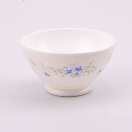 4 bols Arcopal blancs aux motifs floraux bleus