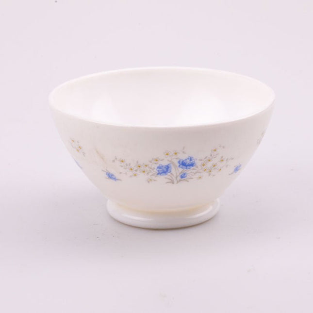4 bols Arcopal blancs aux motifs floraux bleus