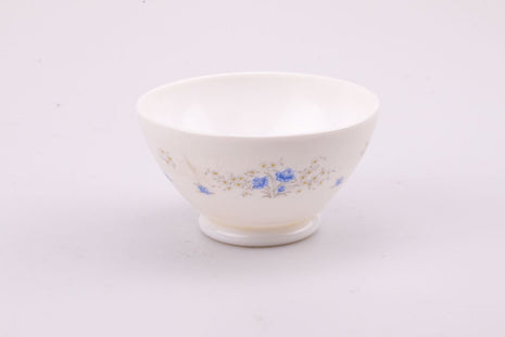 4 bols Arcopal blancs aux motifs floraux bleus