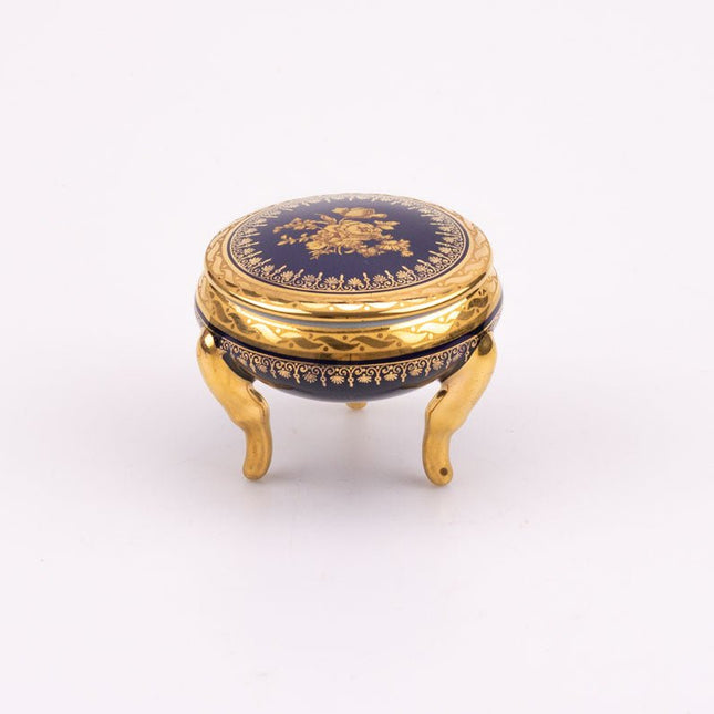 Petite boite en porcelaine de Limoges bleue et dorée