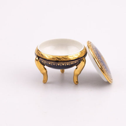 Petite boite en porcelaine de Limoges bleue et dorée