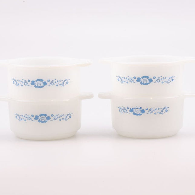 Set of 4 small white glass dishes from the 1960s