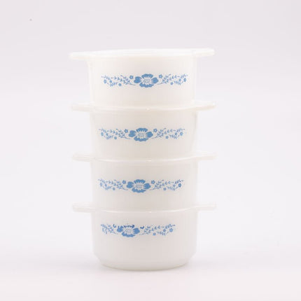 Set van 4 kleine witte glazen schaaltjes uit de jaren 60.