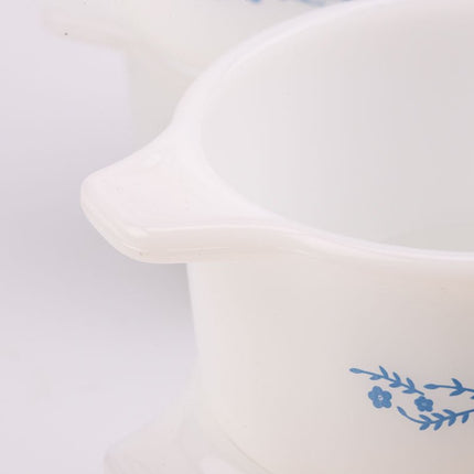 Set van 4 kleine witte glazen schaaltjes uit de jaren 60.