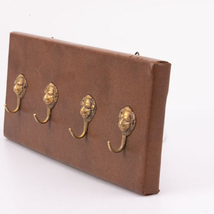 Wandkapstok met 4 gouden haken