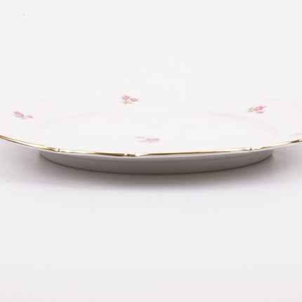 Assiette plate en porcelaine blanche avec roses 