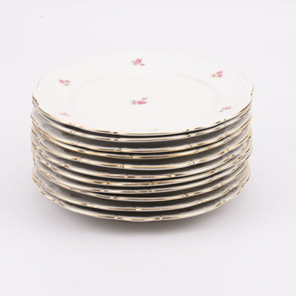 Assiette plate en porcelaine blanche avec roses