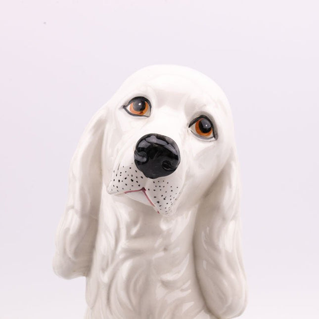 Statue ou tirelire épagneul en céramique blanche