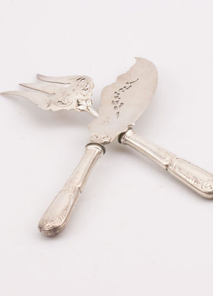 Couverts à poisson en métal argenté