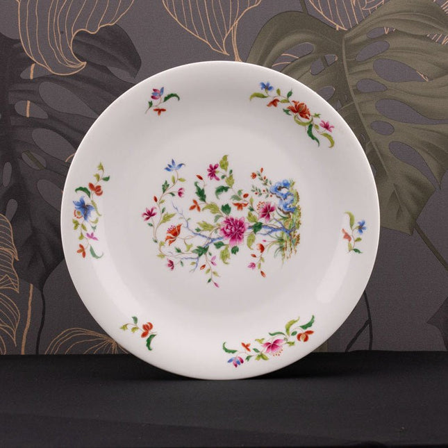 Grande assiette en porcelaine de Limoges blanche avec motifs fleuris