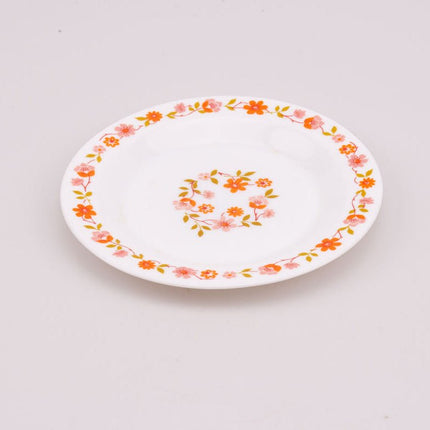 Assiette à dessert vintage Arcopal collection Scania blanche à motifs fleuris oranges