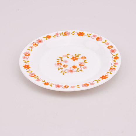 Assiette à dessert vintage Arcopal collection Scania blanche à motifs fleuris oranges