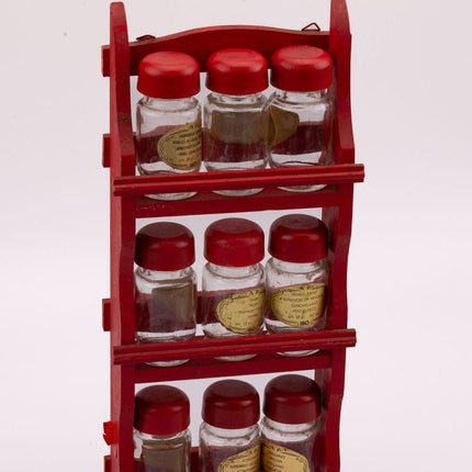 Étagère à épices en bois avec bocaux en verre