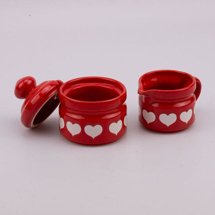 Cafetière, sucrier et pot à lait Waechtersbach rouge avec motifs à coeur