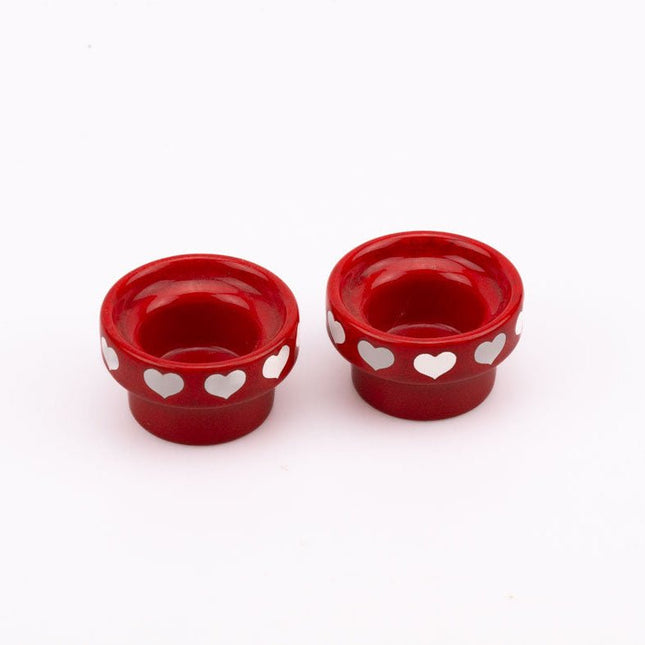 2 bougeoirs vintage rouges avec des cœurs