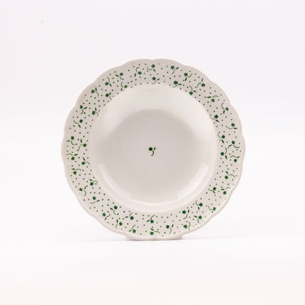 7 assiettes creuses blanches et fleuries de Boch collection Flora