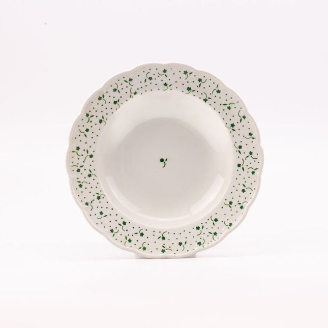 7 assiettes creuses blanches et fleuries de Boch collection Flora