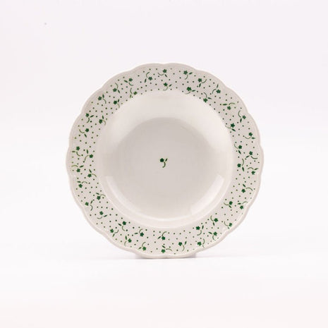 7 assiettes creuses blanches et fleuries de Boch collection Flora