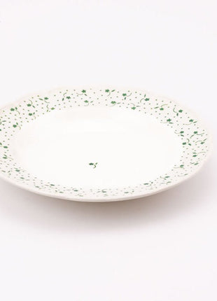 7 assiettes creuses blanches et fleuries de Boch collection Flora