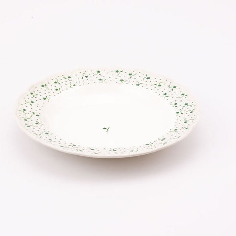 7 assiettes creuses blanches et fleuries de Boch collection Flora