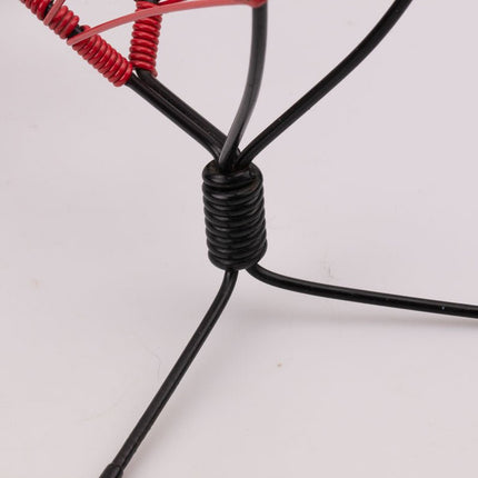 Porte-revues vintage en métal noir et scoubidou rouge - Années 60