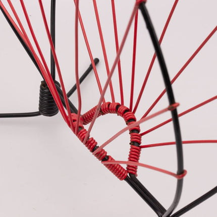 Porte-revues vintage en métal noir et scoubidou rouge - Années 60