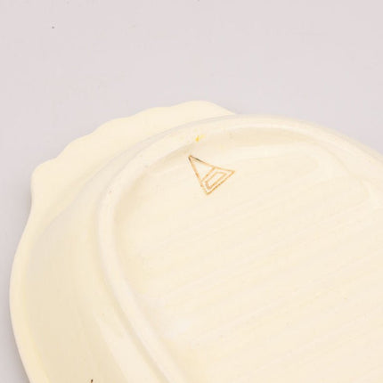 Plat de service vintage jaune et blanc en faïence 