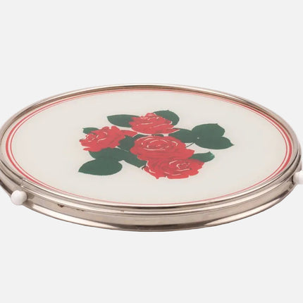 Plateau tournant avec roses rouges et fond blanc