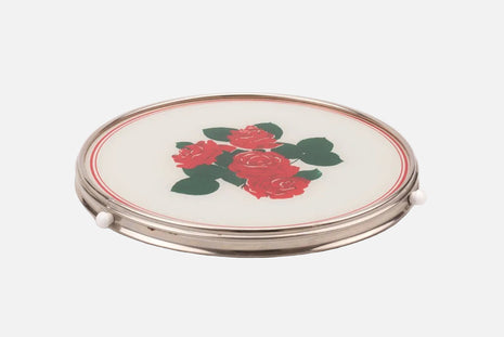 Plateau tournant avec roses rouges et fond blanc