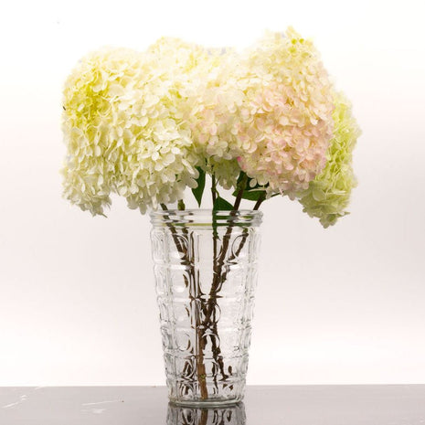 Vase vintage en verre moulé transparent