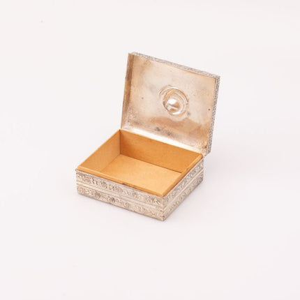 Boîte à bijoux en métal argenté