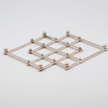 Dessous de Plat Extensible en Acier Inoxydable | Pliable et Ajustable
