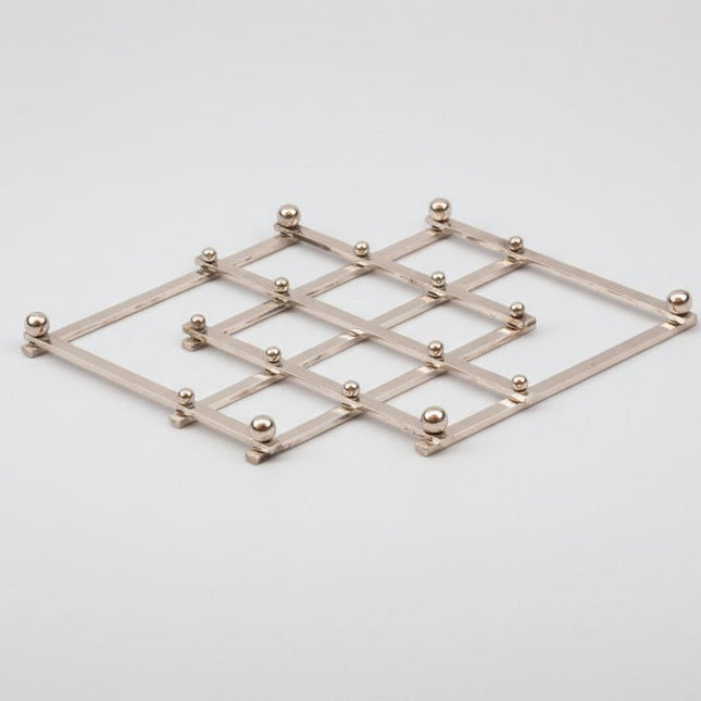 Dessous de Plat Extensible en Acier Inoxydable | Pliable et Ajustable
