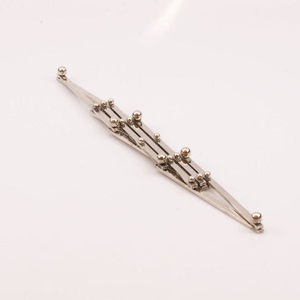 Dessous de Plat Extensible en Acier Inoxydable | Pliable et Ajustable
