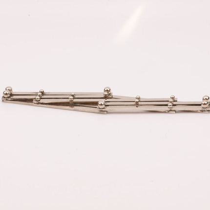 Dessous de Plat Extensible en Acier Inoxydable | Pliable et Ajustable
