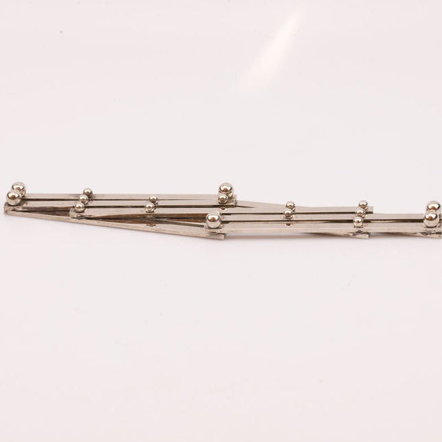 Dessous de Plat Extensible en Acier Inoxydable | Pliable et Ajustable
