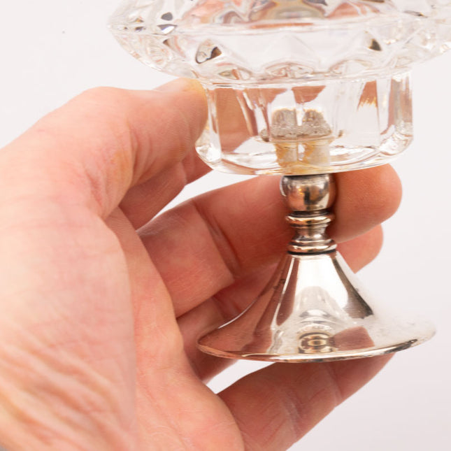Set de 2 bougeoirs en verre sur pied en métal argenté