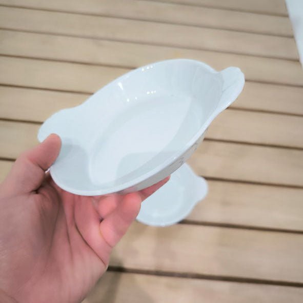 4 plats ronds à oreilles Pillivuyt en porcelaine blanche