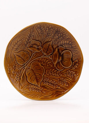 Plat en porcelaine Sarreguemines brun à motifs fleuris en reliefs marron