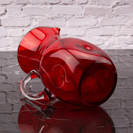 Vintage red glass carafe