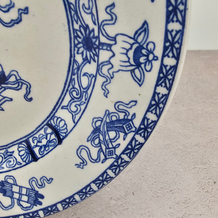 Ancienne assiette plate en céramique blanche et bleue "Poterie" de Société Céramique Maestricht années 1920