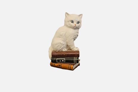 Figurine décorative chat persan vintage avec yeux bleus sur livres - Italie