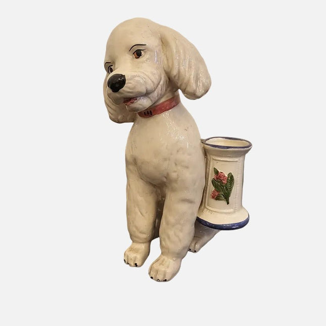 Figurine Bassano caniche assis avec petit vase en céramique blanche